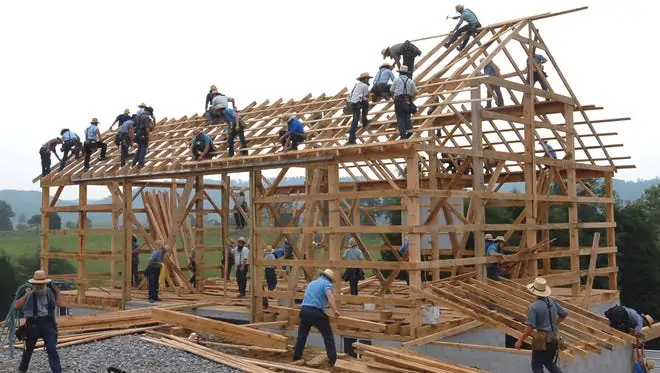 - digital marketing for growing businesses by honeypot marketing Image of Mennonites building a barn.
