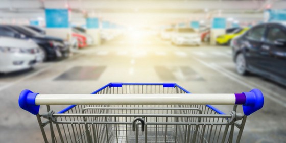 Shopping cart abandoned in a parking garage representing a core remarketing strategy using a Facebook custom audience.