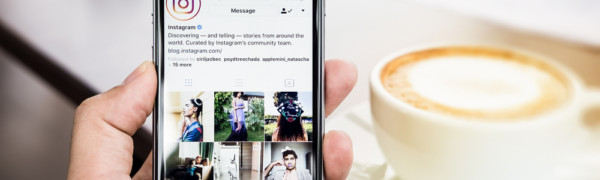 Instargram followers building on a mobile phone with coffee
