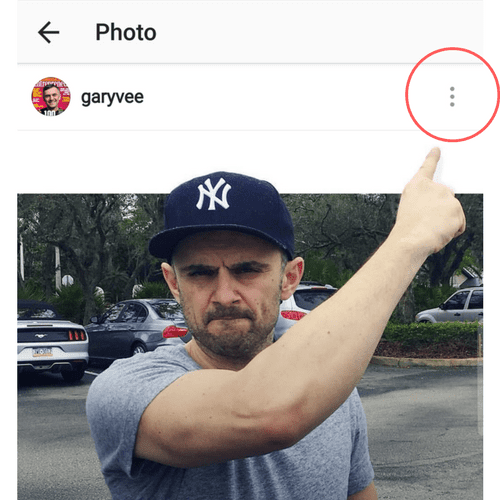 Gary Vaynerchuk pointing to the the three dots above his Instagram post
